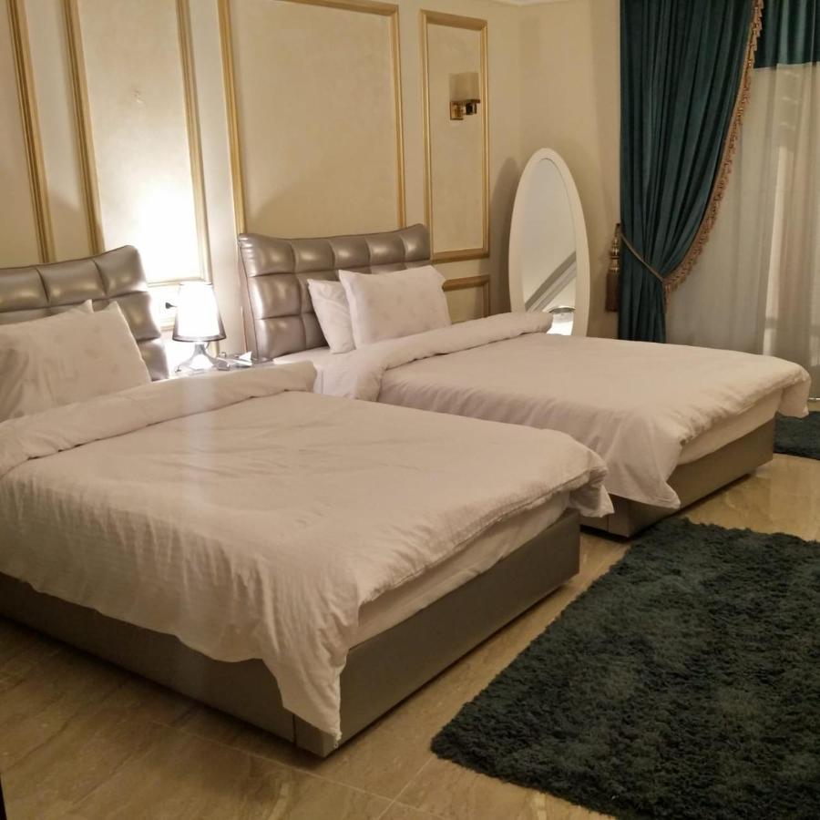 Fleet Club Mahrousa Alexandria Exteriör bild A bedroom in the hotel