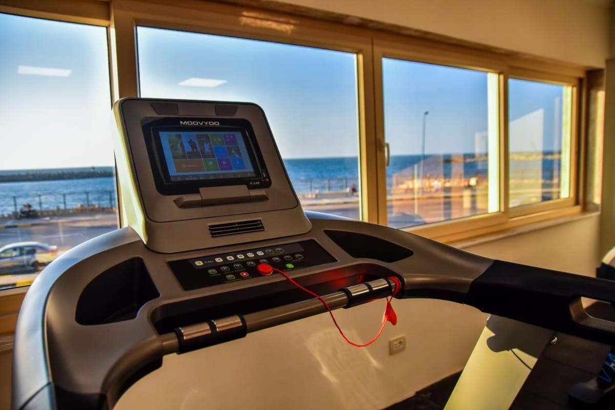 Fleet Club Mahrousa Alexandria Exteriör bild A treadmill with a touchscreen display